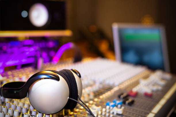 istock headphone on audio mixing console in recording studio 1187176555