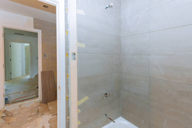 istock Renovation construction laying floor and wall tile reconstruction of bathroom 1187176693