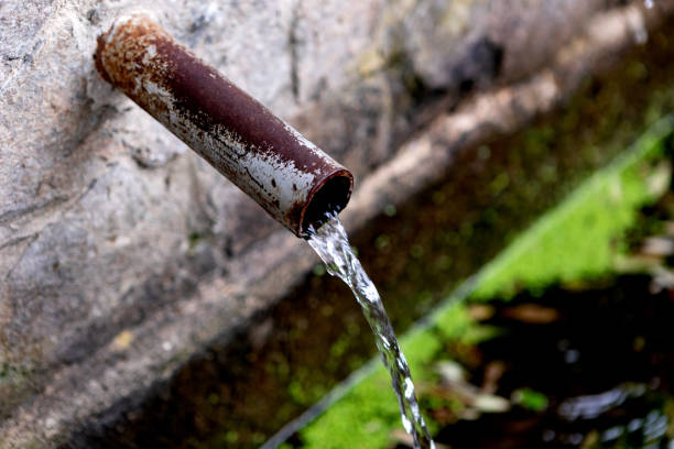 istock Source of two pipes with crystal clear water 1187182302