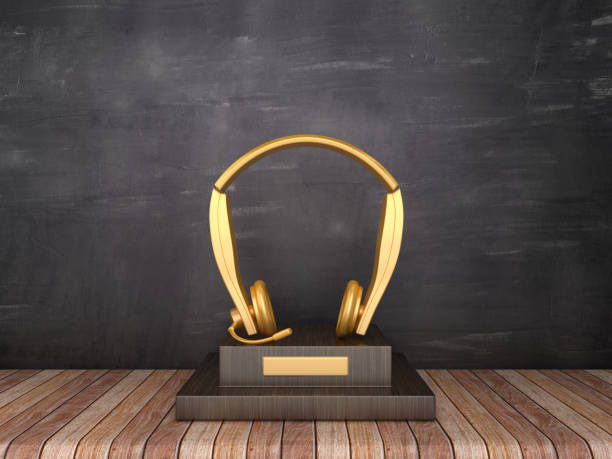 Trophy with Headphones on Wood Floor - Chalkboard Background - 3D Rendering