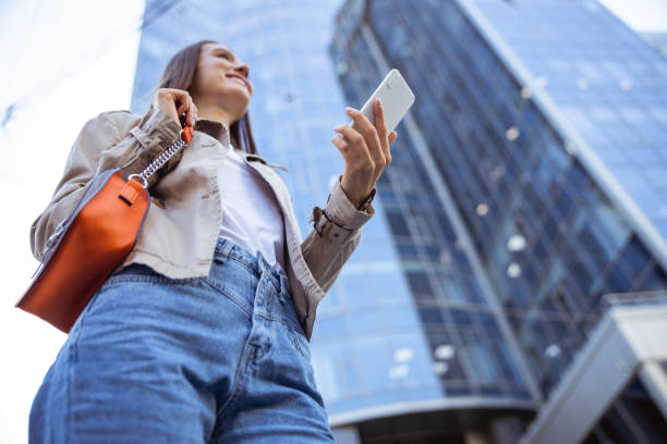 istock Woman enjoying her stroll through the downtown 1187187347
