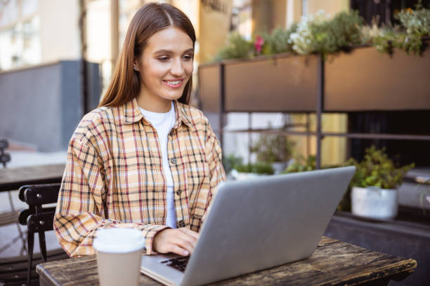 istock Cheerful woman spending her day at work 1187187484