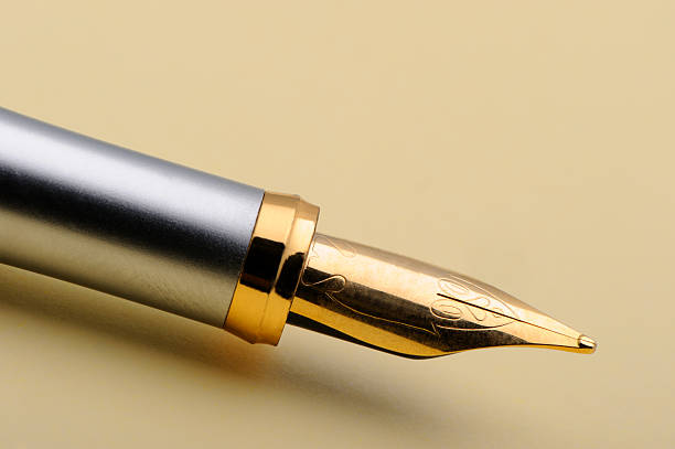 istock Gold fountain pen closeup 118718899
