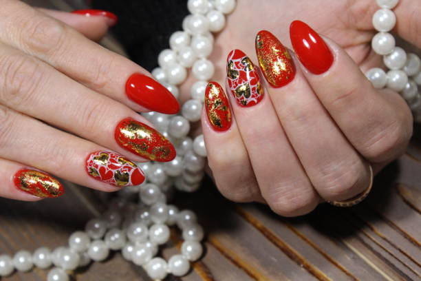 istock fashionable red manicure 1187197578
