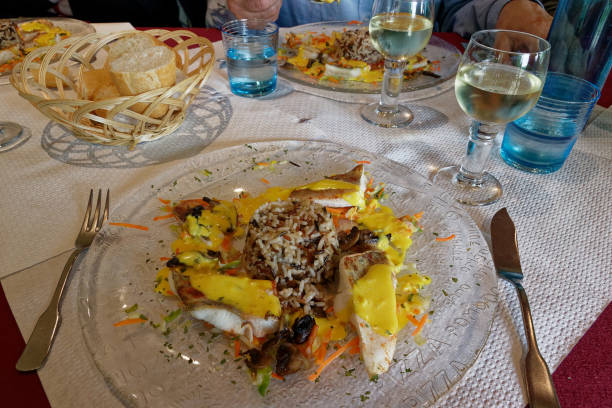 istock Gastro pub meal of haddock, mustard and wild rice 1187197931
