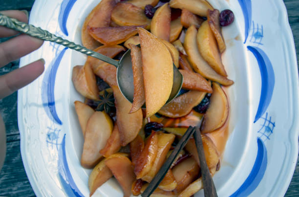 istock juicy tasty pears with spices in caramel 1187201232