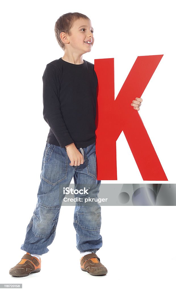 Letra "K" niño - Foto de stock de Blanco - Color libre de derechos