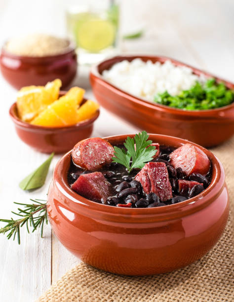 istock Feijoada (bean stew) - Brazilian Traditional Food (Dry Beef, Cabbage, Orange, Rice, Beans) 1187202033
