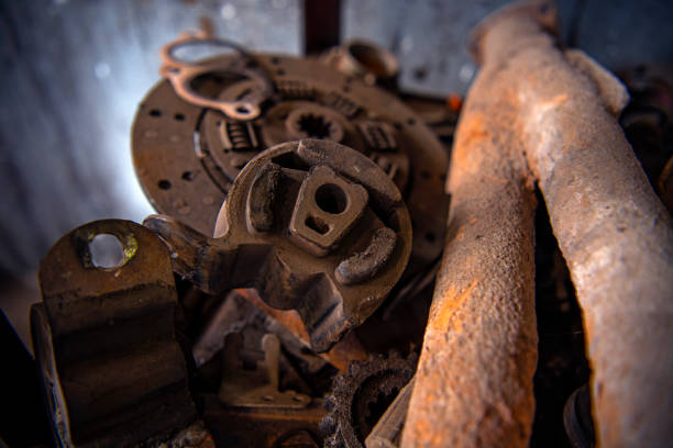 istock Old rusty car parts deposited on a shelf in a garage. 1187204280