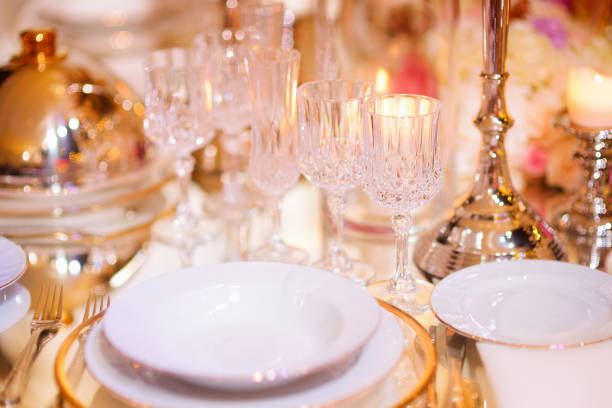 istock Beautiful table setting with crockery and flowers for a party, wedding reception or other festive event 1187208952