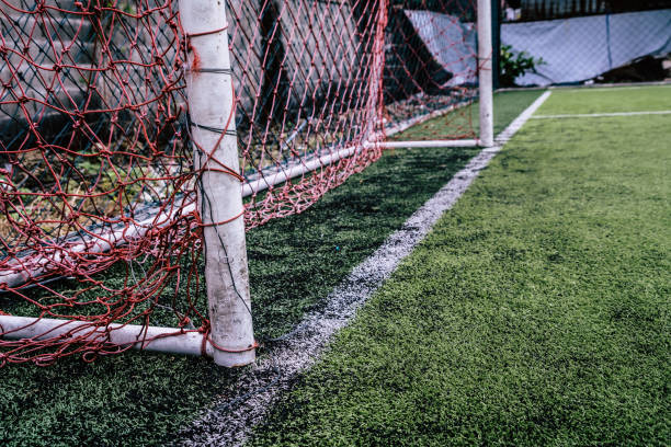istock Rustic soccer goal in a training football field 1187212142
