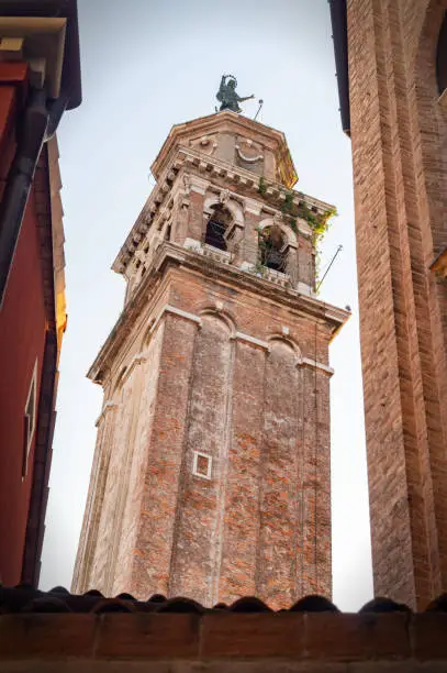 Venice, Italy. Bell tower of church Santa Maria dei Carmini, a large Roman Catholic church