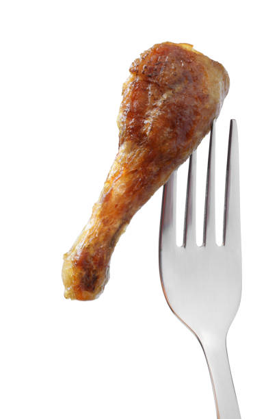 istock Barbecued chicken leg on a fork 1187217891