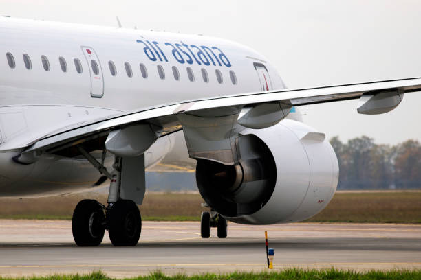 P4-KHD Air Astana Embraer E190-E2 aircraft running on the runway of Borispol International Airport stock photo