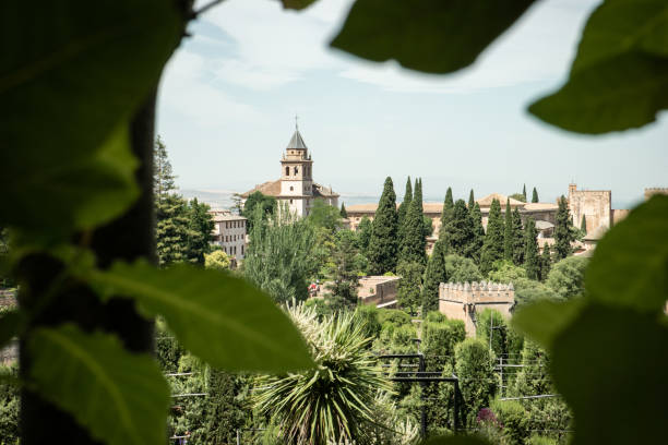 A woman tourist admires the history of ancient Granada, Spain