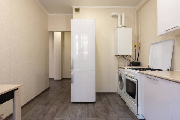 Interior of a small kitchen with a gas boiler