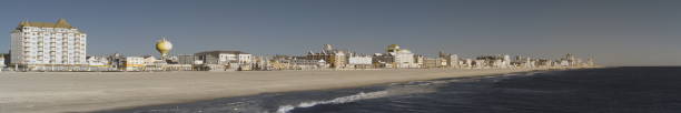 The beach in ocean city, maryland on a bright autumn day with no tourist in sight, and the stores are all closed for the season