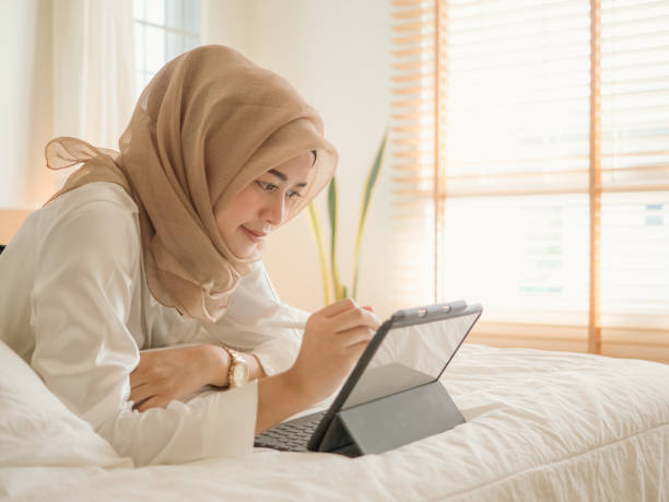istock Muslim woman working at home. 1187225421
