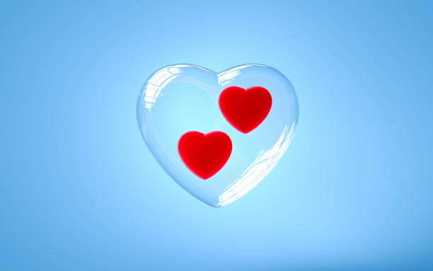 istock 2 red hearts on a blue background - glass - 3d rendering - illustration 1187228054