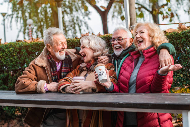 istock Happy seniors in the park take a break from walking 1187231981