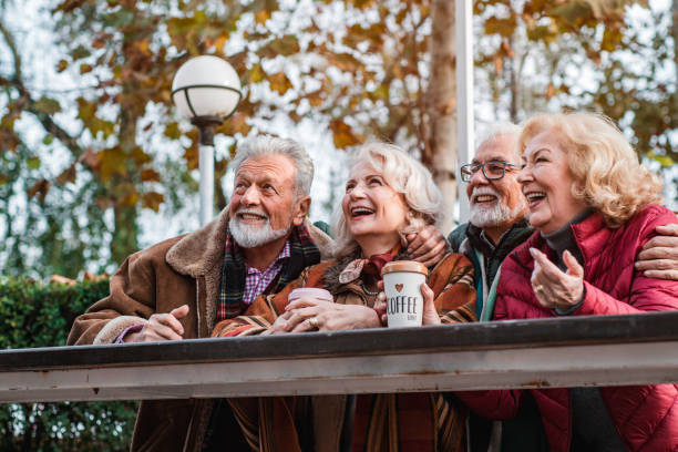 istock Happy seniors in the park take a break from walking 1187232075