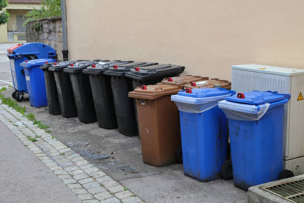 istock Various garbage cans stand on the street 1187233973