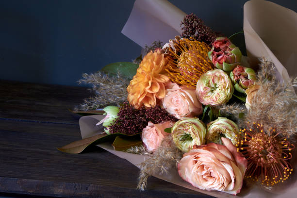 istock Close-up bouquet decorated in vintage style on a dark background, selective focus 1187236456