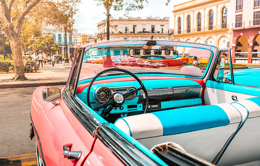 Pink old american classic car in Havana, Cuba