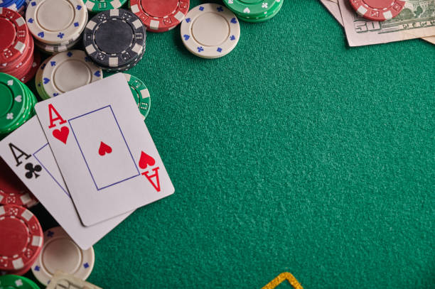 istock Poker, blackjack. Gaming business. Poker table with money, chips 1187244270