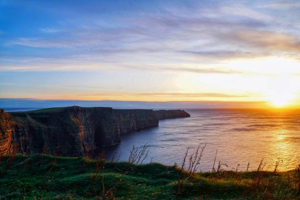 istock Sunset at the Cliffs of Moher, County Clare, Ireland 1187244300