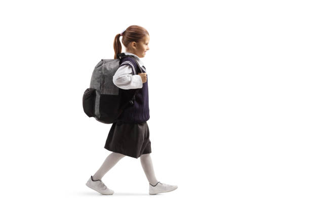 istock Schoolgirl going to school 1187248768