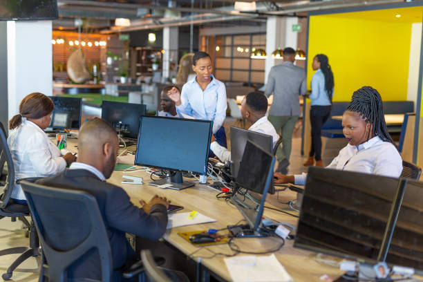 istock African Business People at Work in an Open Plan Office 1187248810