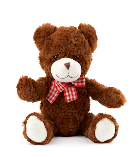 istock teddy bear with a red bow on his neck isolated on a white background 1187251732