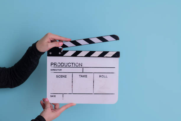 istock movie clapper on cyan background 1187251762