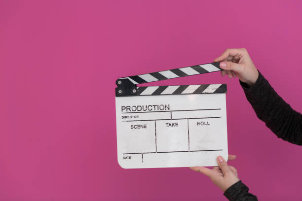 istock movie clapper on pink background 1187253680