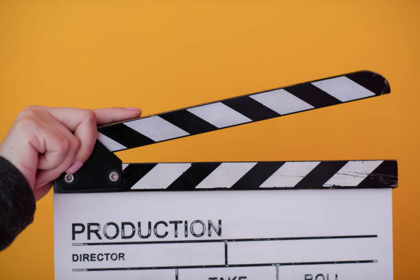 istock movie clapper on yellow background 1187254279
