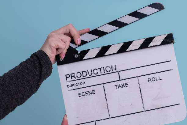 istock movie clapper on cyan background 1187254342