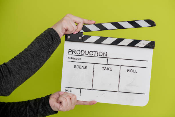 istock movie clapper on green  background 1187254379
