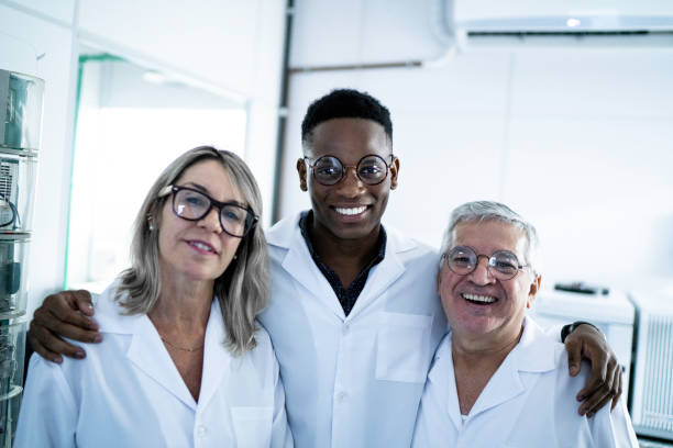 istock Portrait of smiling colleagues in laboratory 1187257121