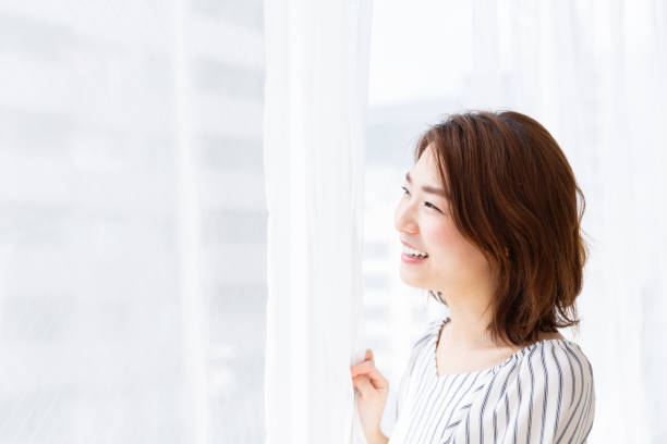 istock asian woman relaxing 1187259233