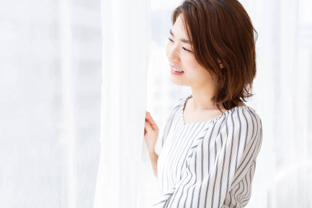 istock asian woman relaxing 1187259273