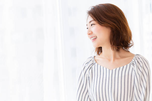 istock asian woman relaxing 1187259333