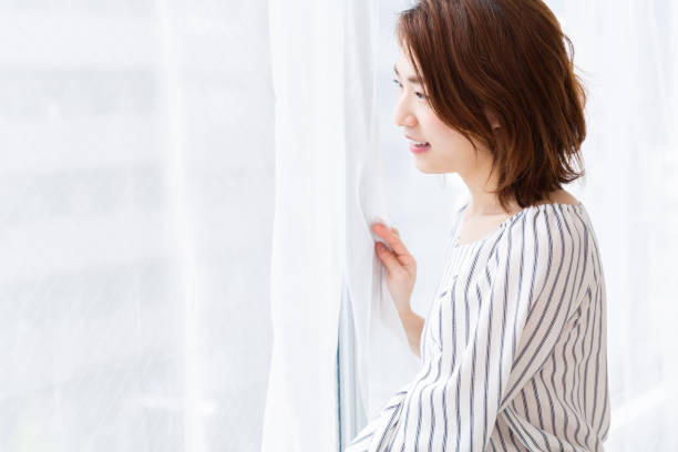 istock asian woman relaxing 1187259343