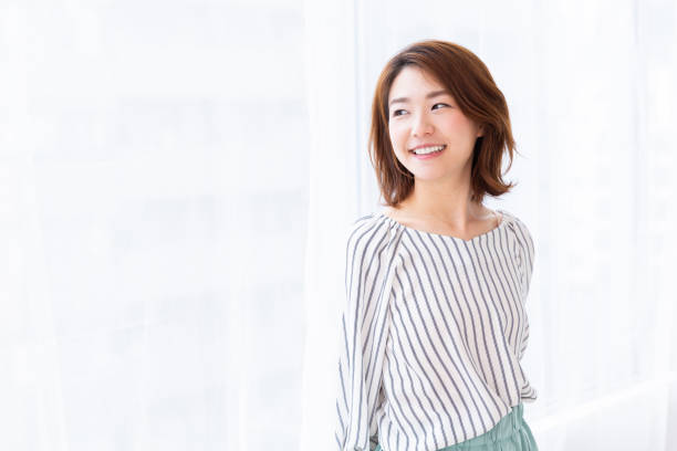 istock asian woman relaxing 1187259399