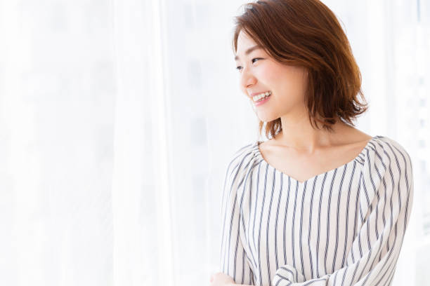 istock asian woman relaxing 1187260028