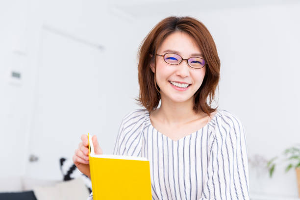 istock attractive asian woman 1187260046