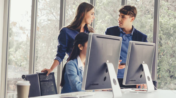 istock Business people having conversation in office. 1187260414