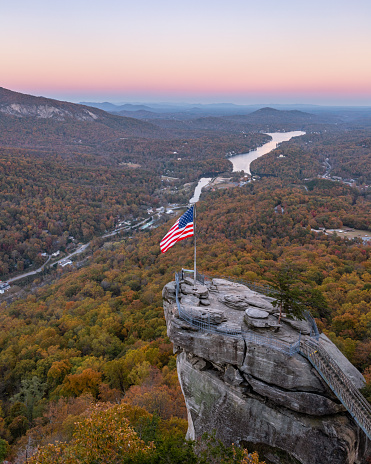 Sunset view of the Chimney Rock and Lake Lure at Chimney Rock, North Carolina in the fall.