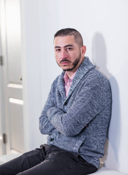 istock Mid adult Hispanic man pouting 1187261463