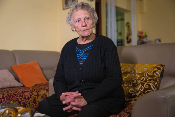 istock Alone Grandmother at home 1187262714